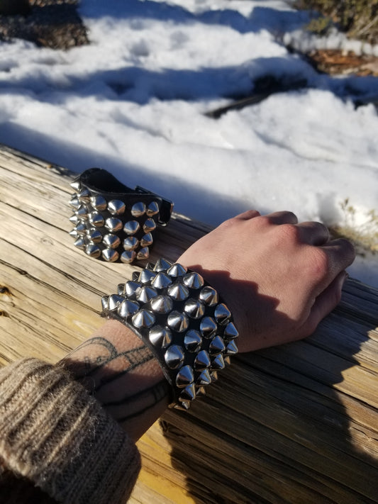 Cone stud wrist cuff
