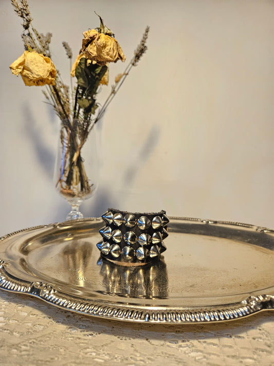Stud & tigar wrist cuff